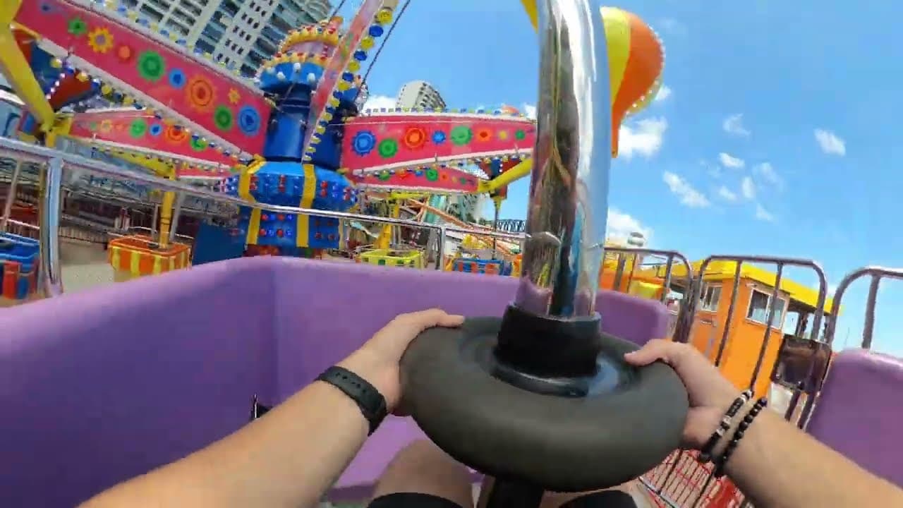 A family on the Cloud Nine hot air balloon ride at Luna Park Sydney